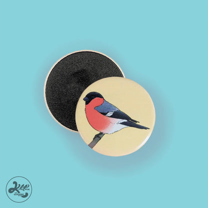 38mm magnet by Kilatora Design. Yellow color with bullfinch art.