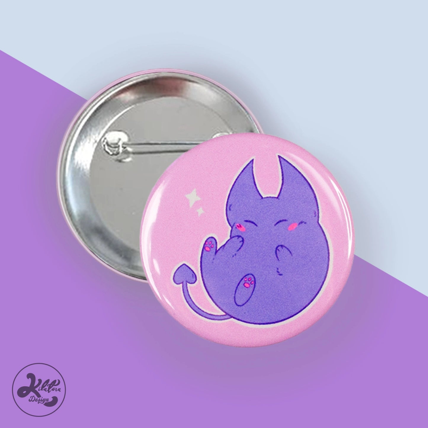 59mm button pin by Kilatora Desing. Pink color with purple Tora devil character.