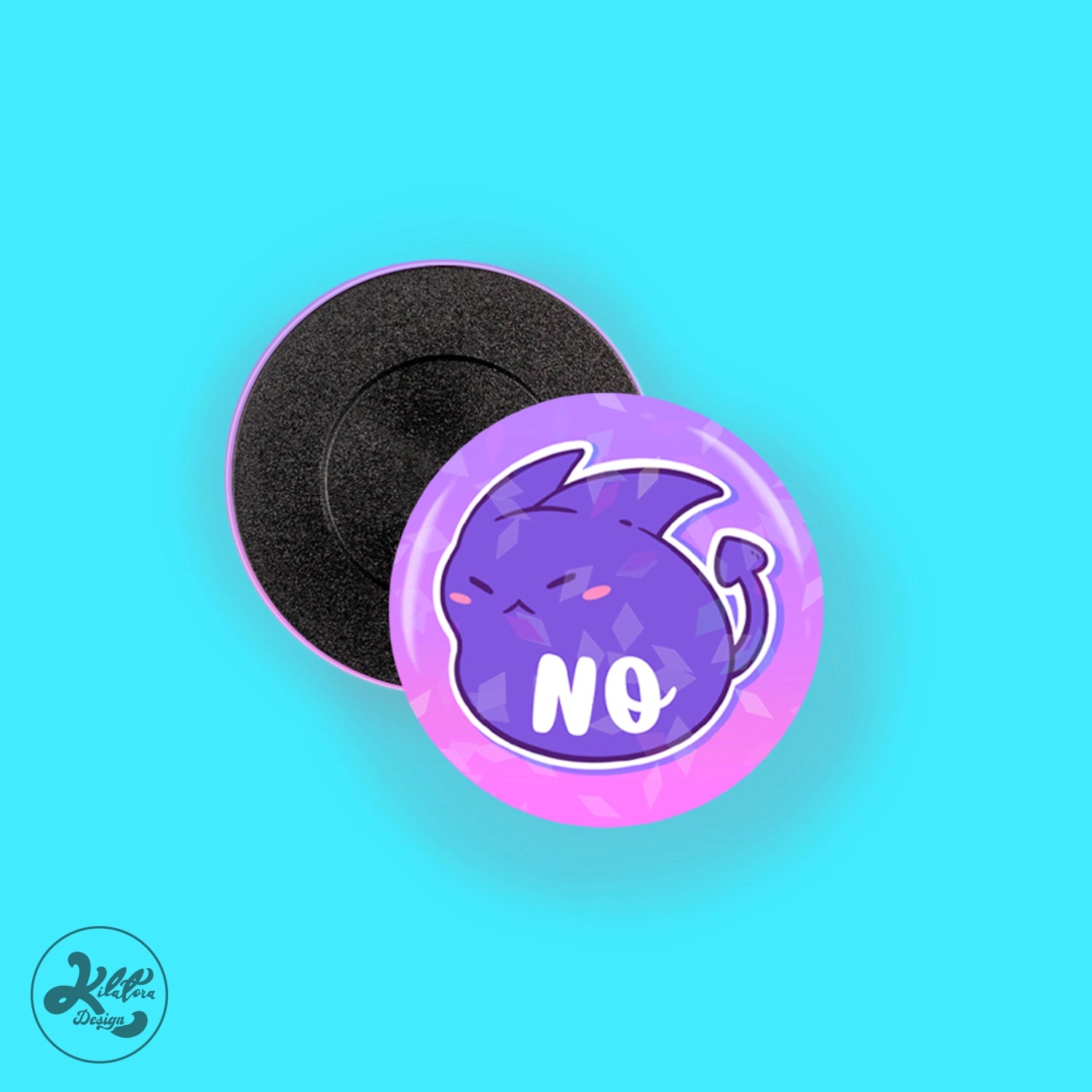 38mm magnet by Kilatora Design. Pink and purple color with broken glass holographic effect. Purple devil character Tora and white text no.