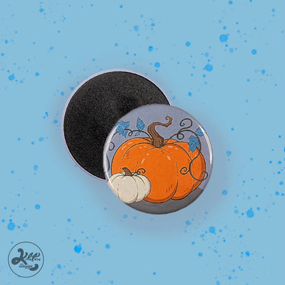 38mm magnet by Kilatora Design. Grey color with one big orange pumpkin and one small white pumpkin.