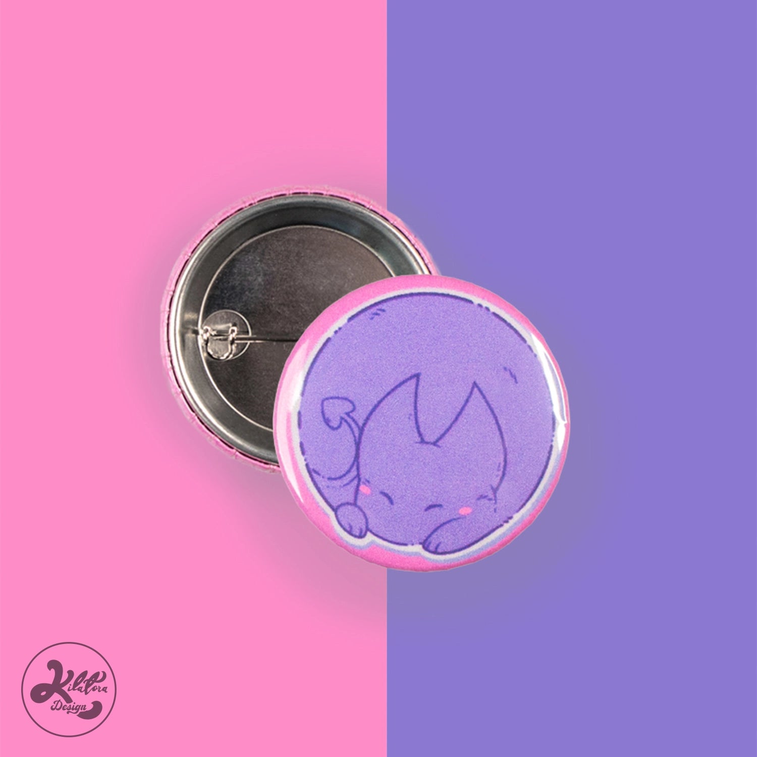 80mm button pin by Kilatora Design. Pink color with purple devil Tora caracter. 