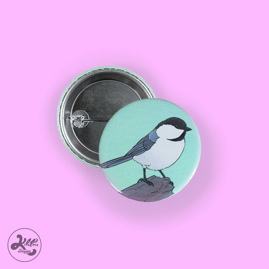 38mm button pin by Kilatora Design.  Light green pin with willow tit art.